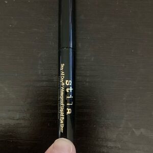 Stilla stay all day waterproof liquid eyeliner in intense black. 0.25 ml size